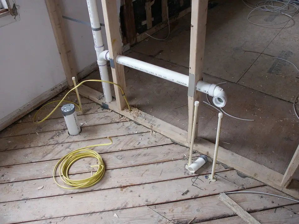 Rough-in plumbing during construction